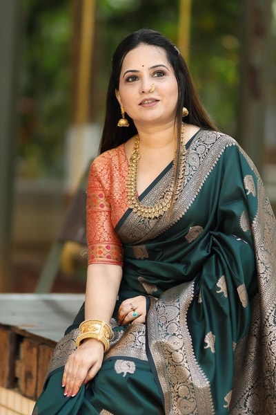 Bottle Green Banarasi Soft Silk Saree with Antique Silver Zari Buttas and Rich Woven Pallu in Surat