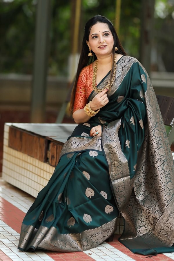 Bottle Green Banarasi Soft Silk Saree with Antique Silver Zari Buttas and Rich Woven Pallu  in Surat