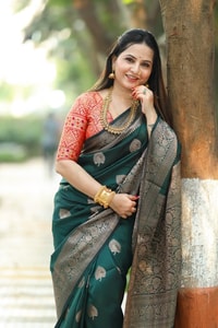 Bottle Green Banarasi Soft Silk Saree with Antique Silver Zari Buttas and Rich Woven Pallu  in Surat