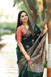 Bottle Green Banarasi Soft Silk Saree with Antique Silver Zari Buttas and Rich Woven Pallu  in Surat