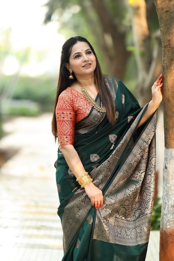 Bottle Green Banarasi Soft Silk Saree with Antique Silver Zari Buttas and Rich Woven Pallu  in Surat