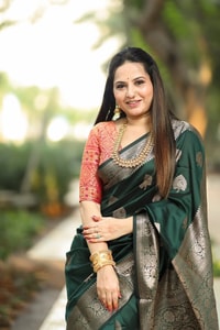 Bottle Green Banarasi Soft Silk Saree with Antique Silver Zari Buttas and Rich Woven Pallu  in Surat