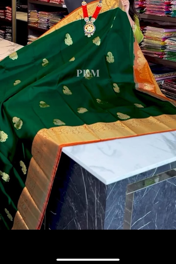 Bottle Green Banarasi Soft Silk Saree with Contrast Orange Border and Checked Orange Pallu  in Surat