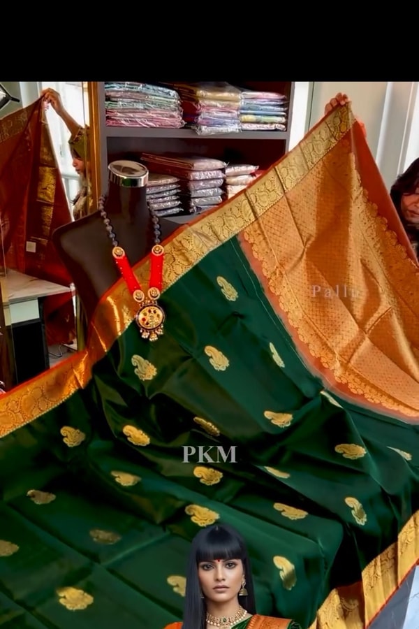 Bottle Green Banarasi Soft Silk Saree with Contrast Orange Border and Checked Orange Pallu  in Surat