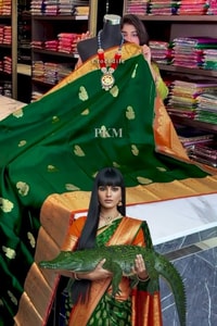 Bottle Green Banarasi Soft Silk Saree with Contrast Orange Border and Checked Orange Pallu  in Surat video 1