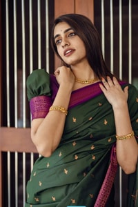 Bottle Green Banarasi Soft Silk Saree with Copper Zari Buttis and Contrast Purple Pallu  in Surat