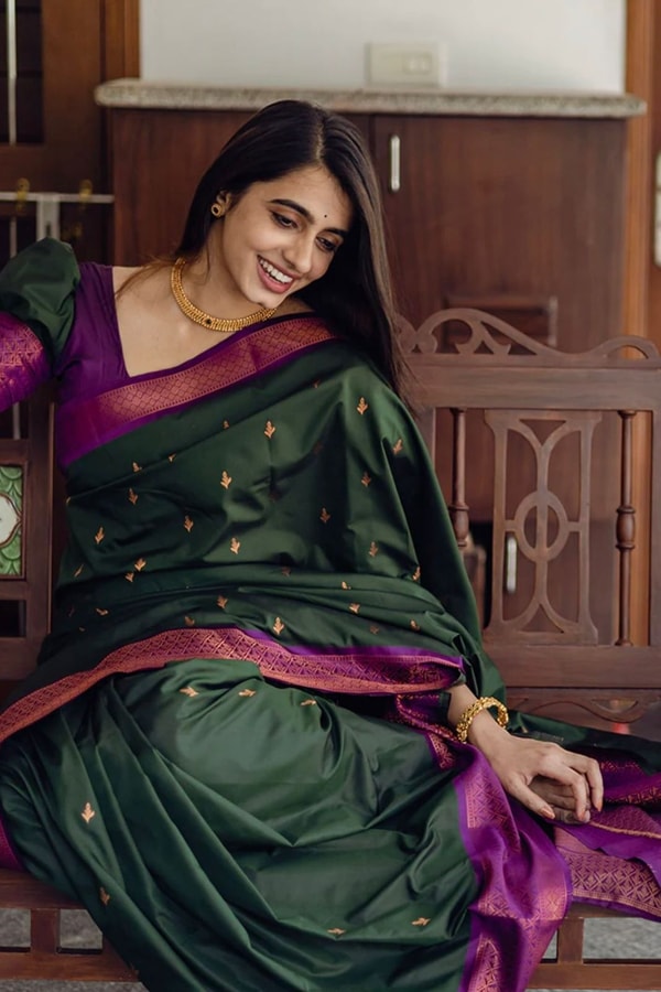 Bottle Green Banarasi Soft Silk Saree with Copper Zari Buttis and Contrast Purple Pallu  in Surat