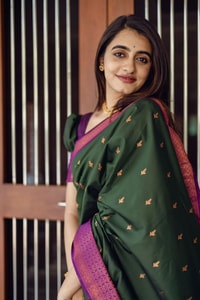 Bottle Green Banarasi Soft Silk Saree with Copper Zari Buttis and Contrast Purple Pallu  in Surat