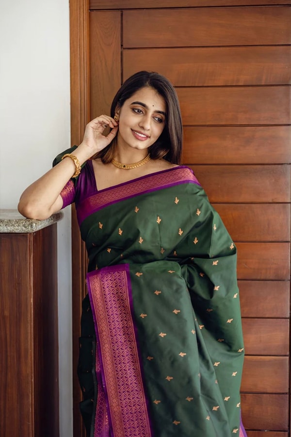 Bottle Green Banarasi Soft Silk Saree with Copper Zari Buttis and Contrast Purple Pallu  in Surat
