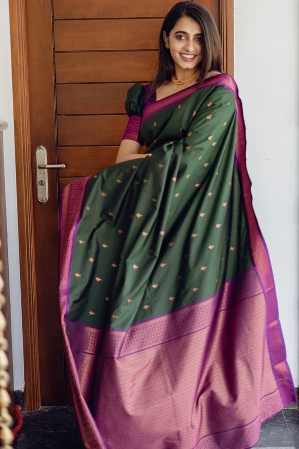 Bottle Green Banarasi Soft Silk Saree with Copper Zari Buttis and Contrast Purple Pallu  in Surat