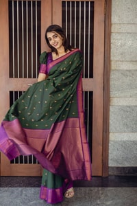 Bottle Green Banarasi Soft Silk Saree with Copper Zari Buttis and Contrast Purple Pallu  in Surat