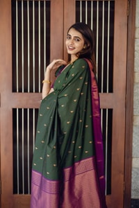 Bottle Green Banarasi Soft Silk Saree with Copper Zari Buttis and Contrast Purple Pallu  in Surat