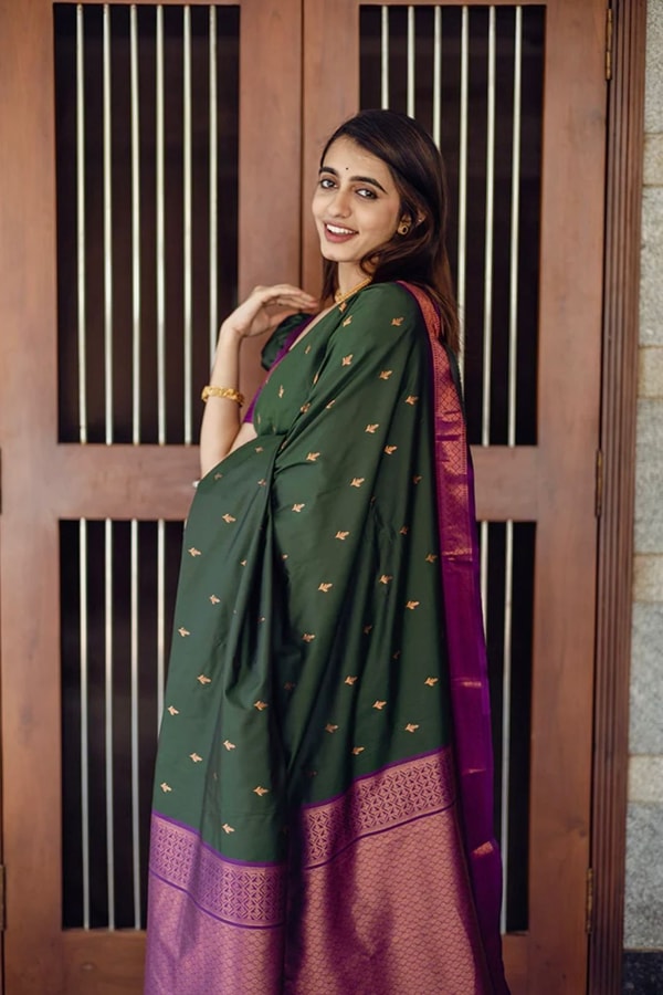 Bottle Green Banarasi Soft Silk Saree with Copper Zari Buttis and Contrast Purple Pallu  in Surat