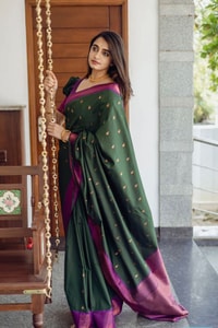 Bottle Green Banarasi Soft Silk Saree with Copper Zari Buttis and Contrast Purple Pallu  in Surat