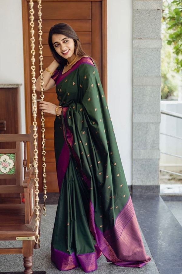 Bottle Green Banarasi Soft Silk Saree with Copper Zari Buttis and Contrast Purple Pallu  in Surat