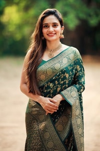 Bottle Green Banarasi Soft Silk Saree with Gold Zari Buttis and Wide Gold Zari Border  in Surat