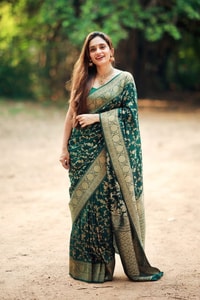 Bottle Green Banarasi Soft Silk Saree with Gold Zari Buttis and Wide Gold Zari Border  in Surat