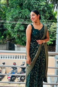 Bottle Green Banarasi Soft Silk Saree with Gold Zari Buttis and Wide Gold Zari Border  in Surat