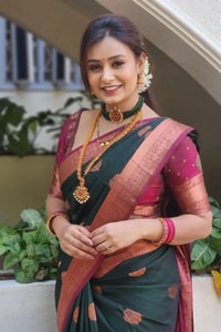 Bottle Green Banarasi Soft Silk Saree with Pink Contrast Border and Copper Zari Butis  in Surat