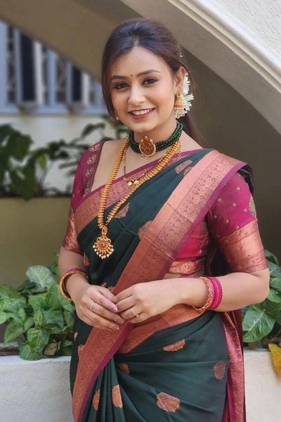 Bottle Green Banarasi Soft Silk Saree with Pink Contrast Border and Copper Zari Butis in Surat