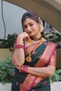 Bottle Green Banarasi Soft Silk Saree with Pink Contrast Border and Copper Zari Butis  in Surat