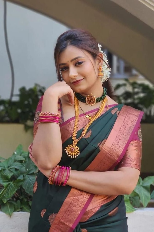 Bottle Green Banarasi Soft Silk Saree with Pink Contrast Border and Copper Zari Butis  in Surat