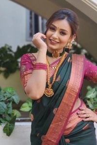 Bottle Green Banarasi Soft Silk Saree with Pink Contrast Border and Copper Zari Butis  in Surat