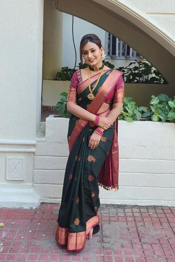 Bottle Green Banarasi Soft Silk Saree with Pink Contrast Border and Copper Zari Butis  in Surat