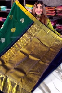 Bottle Green Banarasi Soft Silk Saree with Silver Leaf Buttas and Navy Blue Contrast Pallu  in Surat