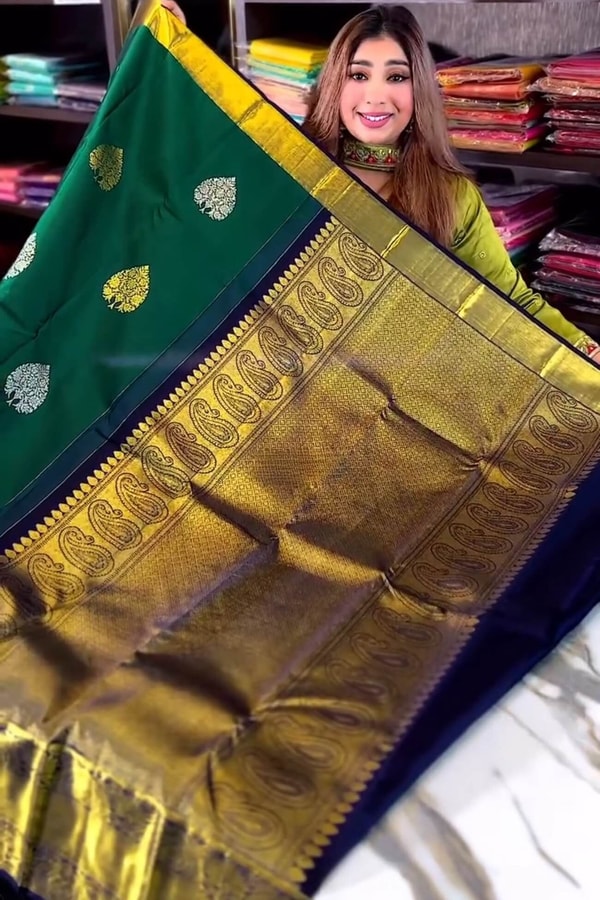 Bottle Green Banarasi Soft Silk Saree with Silver Leaf Buttas and Navy Blue Contrast Pallu  in Surat