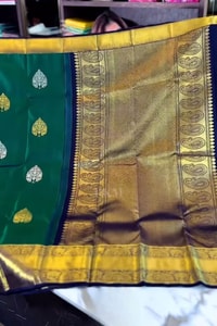 Bottle Green Banarasi Soft Silk Saree with Silver Leaf Buttas and Navy Blue Contrast Pallu  in Surat
