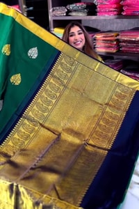 Bottle Green Banarasi Soft Silk Saree with Silver Leaf Buttas and Navy Blue Contrast Pallu  in Surat