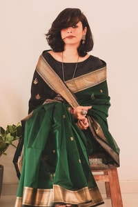 Bottle Green Saree with Contrast Black Zari Pallu, Gold Border and Tassels  in Surat