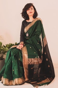 Bottle Green Saree with Contrast Black Zari Pallu, Gold Border and Tassels  in Surat