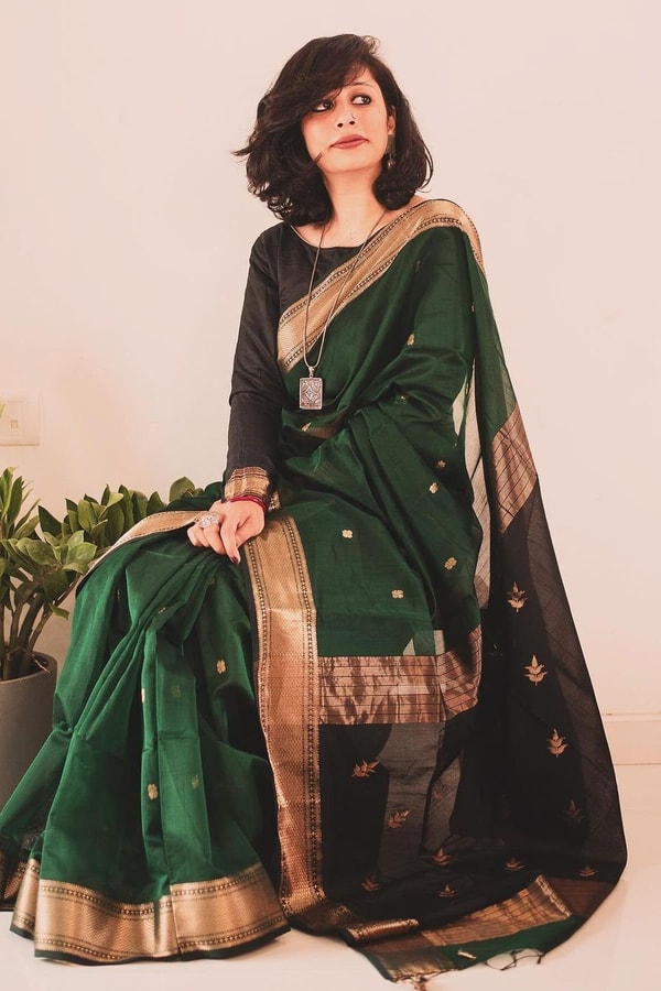 Bottle Green Saree with Contrast Black Zari Pallu, Gold Border and Tassels  in Surat