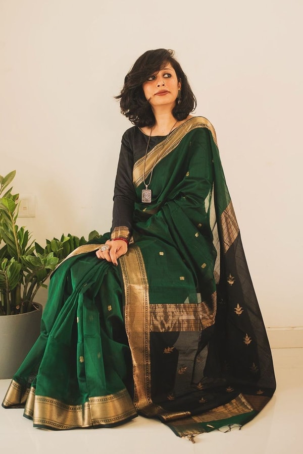 Bottle Green Saree with Contrast Black Zari Pallu, Gold Border and Tassels  in Surat
