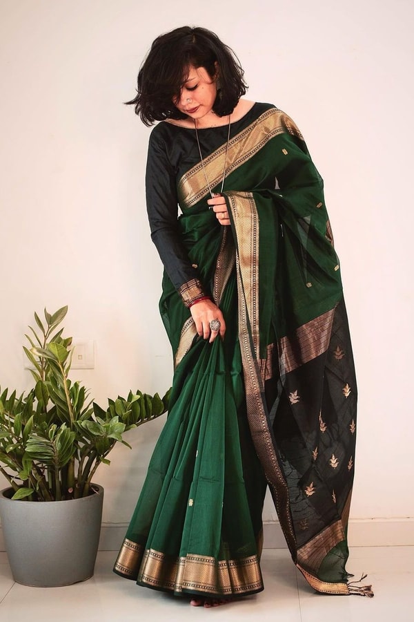 Bottle Green Saree with Contrast Black Zari Pallu, Gold Border and Tassels  in Surat