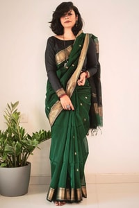 Bottle Green Saree with Contrast Black Zari Pallu, Gold Border and Tassels  in Surat