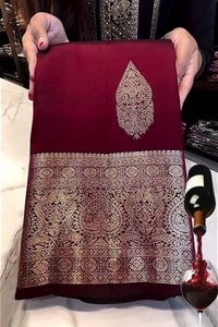 Burgundy Banarasi Soft Silk Saree with Pale Zari Leaf Buttas and Wide Brocade Pallu  in Surat