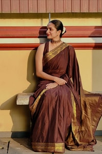 Chocolate Brown Banarasi Soft Silk Saree with Plain Body and Wide Gold Zari Border  in Surat