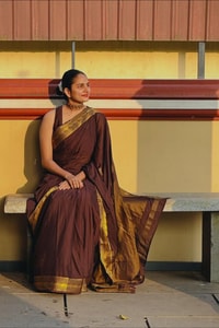 Chocolate Brown Banarasi Soft Silk Saree with Plain Body and Wide Gold Zari Border  in Surat