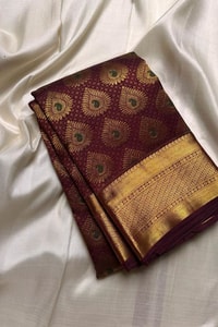 Chocolate Maroon Banarasi Soft Silk Saree with All-Over Gold Leaf Buttas and Zari Pallu  in Surat