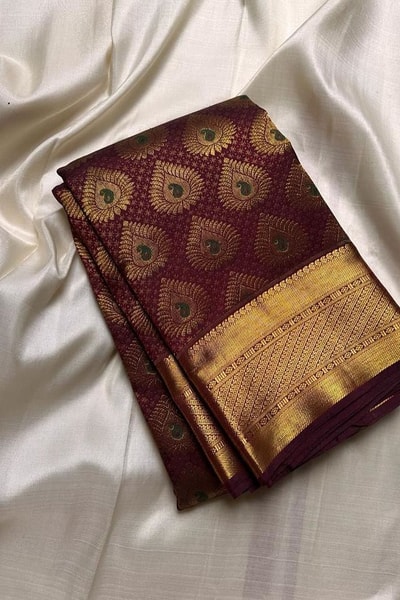 Chocolate Maroon Banarasi Soft Silk Saree with All-Over Gold Leaf Buttas and Zari Pallu in Surat