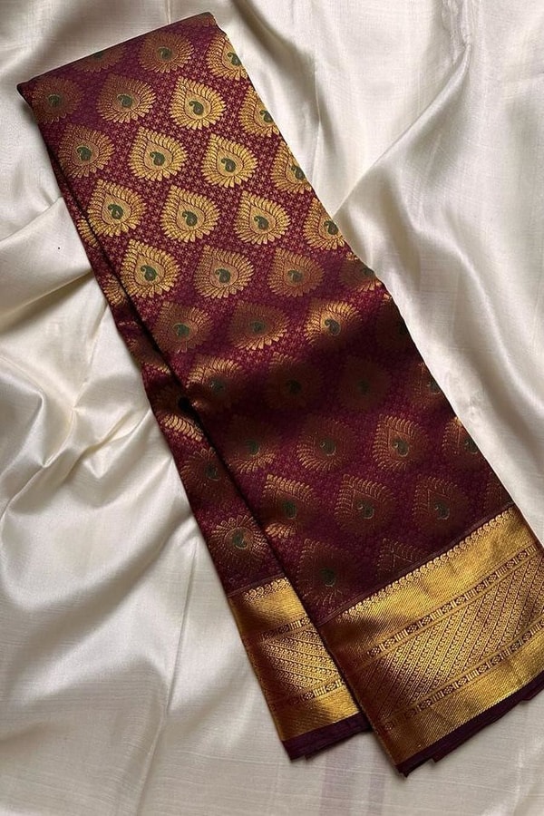 Chocolate Maroon Banarasi Soft Silk Saree with All-Over Gold Leaf Buttas and Zari Pallu  in Surat