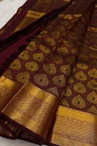 Chocolate Maroon Banarasi Soft Silk Saree with All-Over Gold Leaf Buttas and Zari Pallu  in Surat