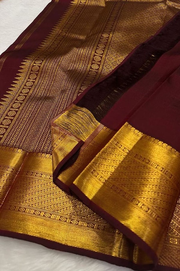 Chocolate Maroon Banarasi Soft Silk Saree with All-Over Gold Leaf Buttas and Zari Pallu  in Surat
