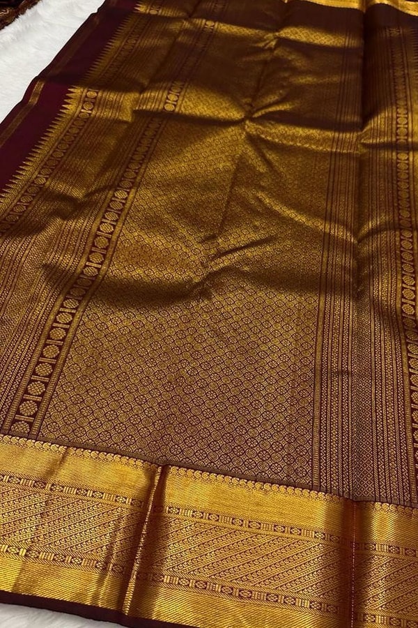 Chocolate Maroon Banarasi Soft Silk Saree with All-Over Gold Leaf Buttas and Zari Pallu  in Surat