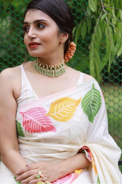Colourful Leaf Motif Banarasi Soft Silk Saree with Gold and Copper Zari in Off-White and Black in Surat