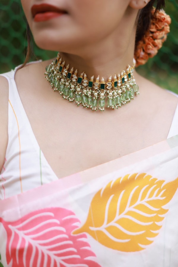 Colourful Leaf Motif Banarasi Soft Silk Saree with Gold and Copper Zari in Off-White and Black  in Surat