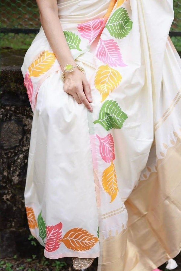 Colourful Leaf Motif Banarasi Soft Silk Saree with Gold and Copper Zari in Off-White and Black  in Surat